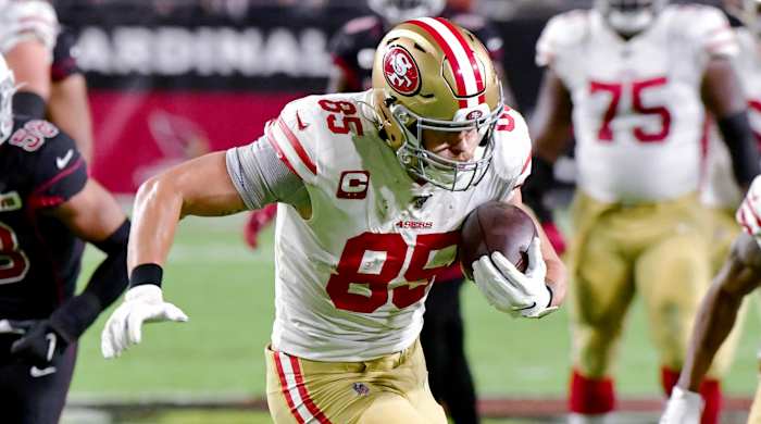 Oct 31, 2019; Glendale, AZ, USA; San Francisco 49ers tight end George Kittle (85) breaks a tackle by Arizona Cardinals safety Deionte Thompson (35) to score a touchdown in the first quarter at State Farm Stadium. Mandatory Credit: Matt Kartozian-USA TODAY Sports